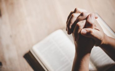 spirituality-religion-hands-folded-prayer-holy-bible-church-concept-faith_1150-12945